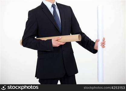 Businessman with a roll of paper