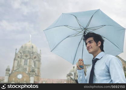 Businessman with an umbrella