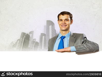 Businessman with blank banner