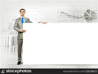 Businessman with blank banner