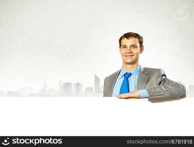 Businessman with blank banner