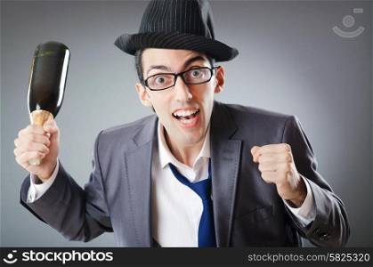 Businessman with bottle of champagne
