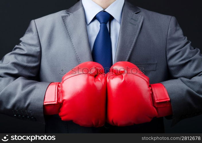 Businessman with boxing gloves