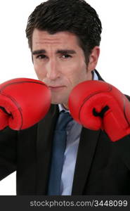 Businessman with boxing gloves