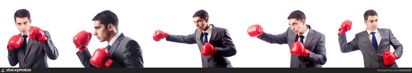 Businessman with boxing gloves on white