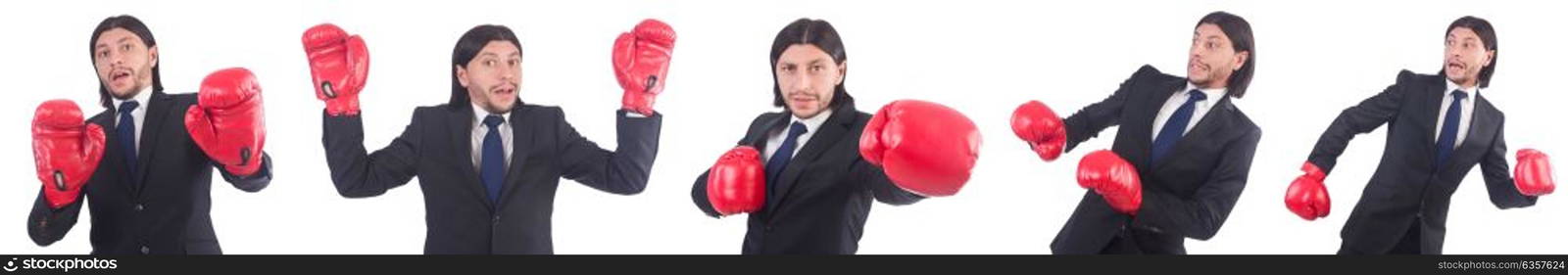 Businessman with boxing gloves on white