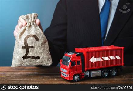 Businessman with british pound sterling money bag and truck. Good salaries for drivers. Rising prices, global containers shortage crisis. Logistics. High income of the transport business