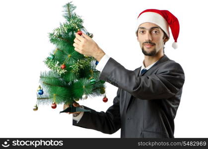 Businessman with christmas tree on white