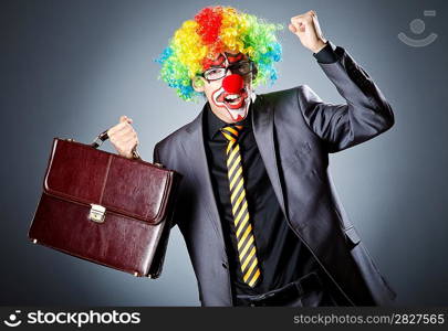 Businessman with clown wig and face paint