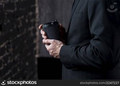 businessman with coffee paper cup