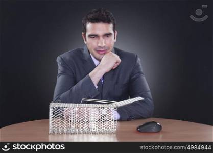Businessman with digital mouse and trap