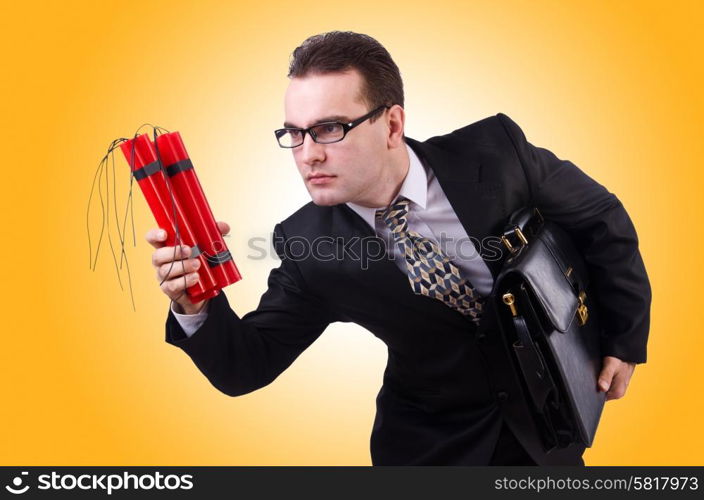 Businessman with dynamite isolated on white