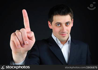 businessman with finger up
