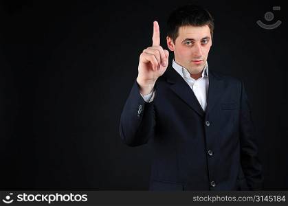 businessman with finger up