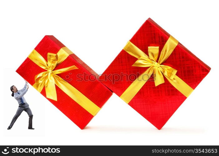 Businessman with gift boxes on white