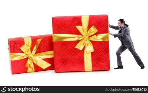 Businessman with gift boxes on white