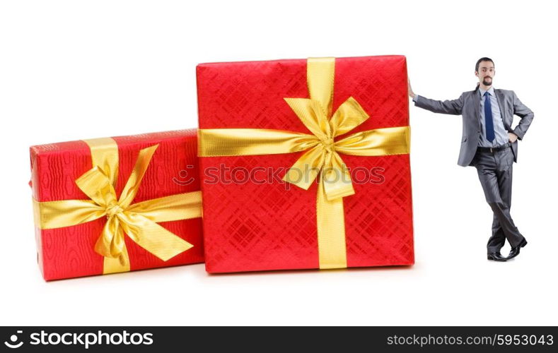 Businessman with gift boxes on white