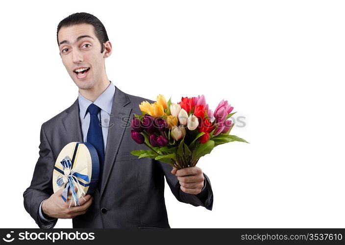 Businessman with giftbox and flowers
