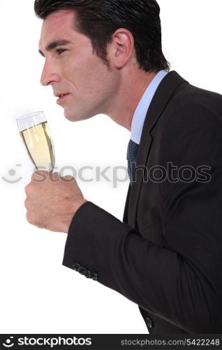 Businessman with glass of champagne