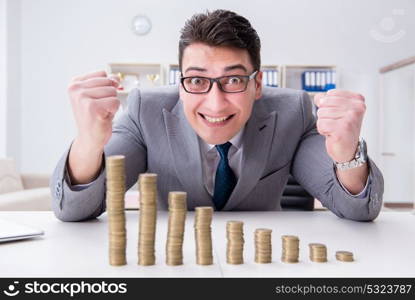 Businessman with golden coins in business growth concept