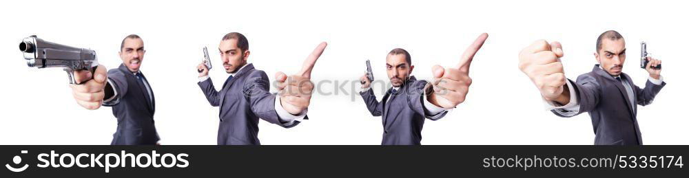 Businessman with gun isolated on white