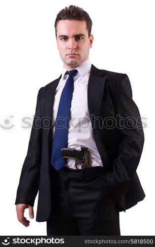 Businessman with gun isolated on white