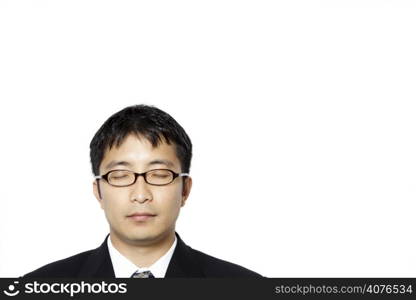 Businessman with his eyes closed