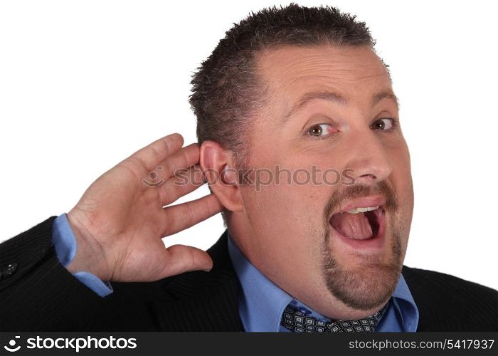Businessman with his hand to his ear