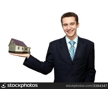 businessman with house in hand isolated on white
