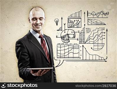Businessman with ipad in hands