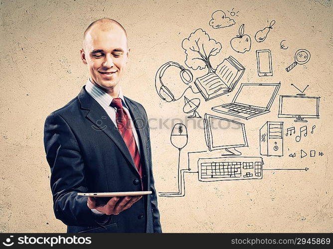 Businessman with ipad in hands