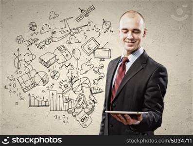 Businessman with ipad in hands. Image of businessman holding ipad. Collage drawings