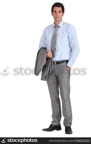 Businessman with jacket over arm