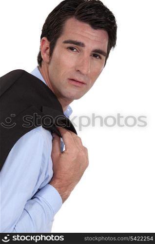 Businessman with jacket over his shoulder
