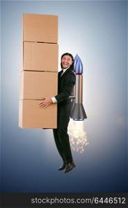 Businessman with jetpack delivering boxes globally