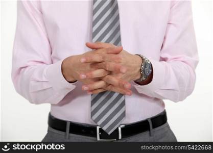 businessman with joined hands making presentation