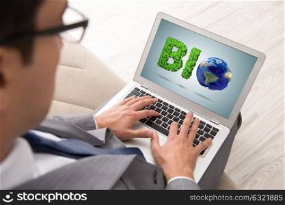 Businessman with laptop in bio concept