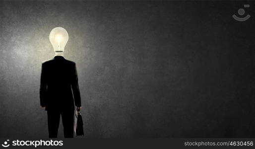 Businessman with light bulb instead of head. Great mentality