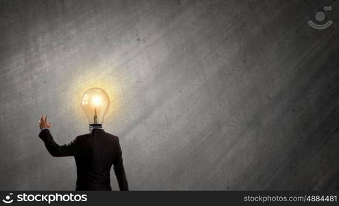 Businessman with light bulb instead of head. Great mentality