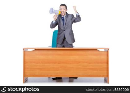 Businessman with loudspeaker at the desk