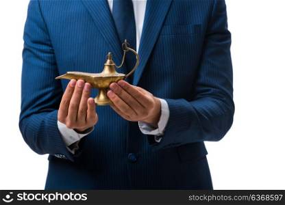 Businessman with magic lamp isolated on white