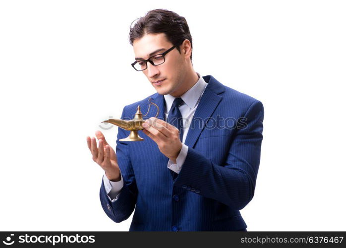 Businessman with magic lamp isolated on white