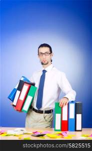 Businessman with many office folders