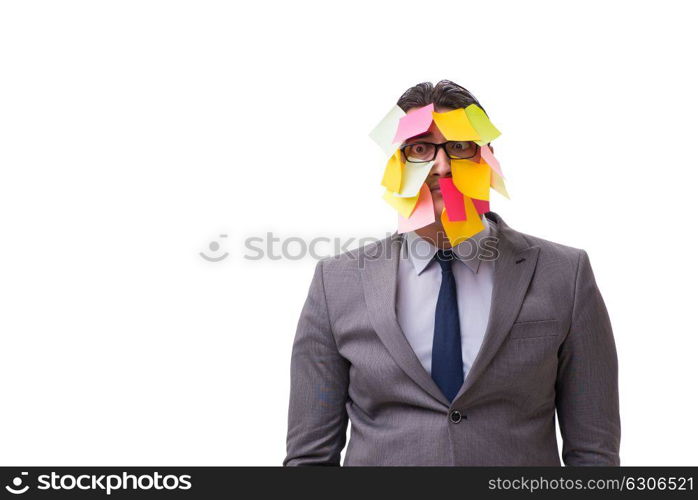 Businessman with many reminders isolated on white