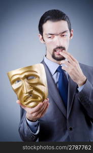 Businessman with mask concealing his identity