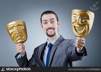 Businessman with mask concealing his identity