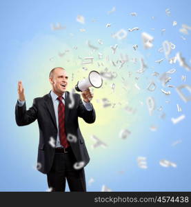 Businessman with megaphone. Image of angry businessman screaming in megaphone