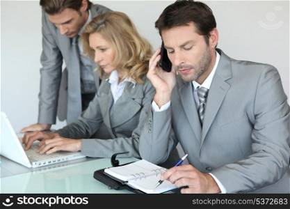 Businessman with mobile telephone