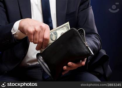 Businessman with money in hands.