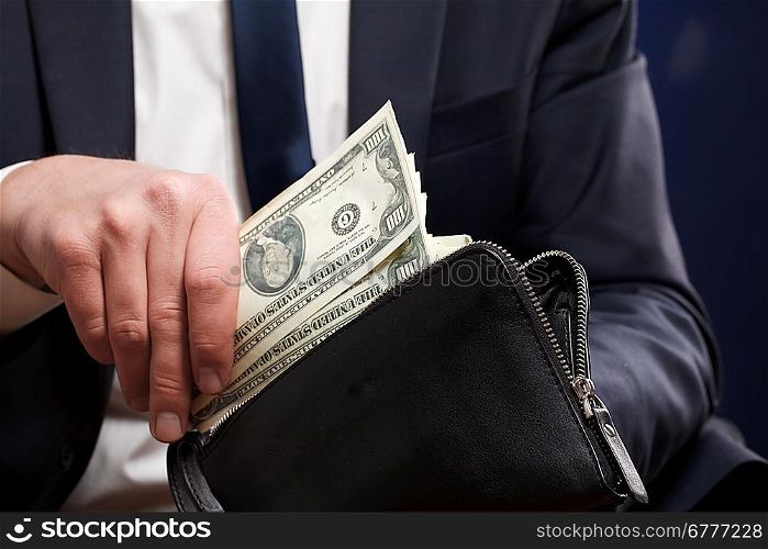 Businessman with money in hands.